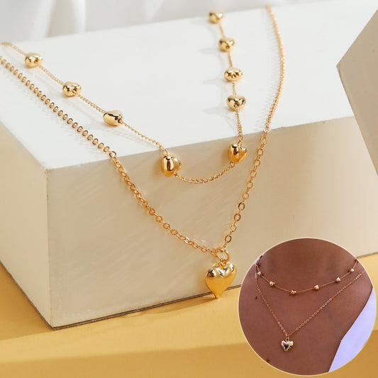 Gold Multi-Row Necklace with Heart Pendant