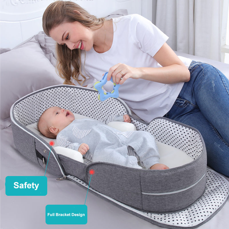Diaper backpack with foldable bed