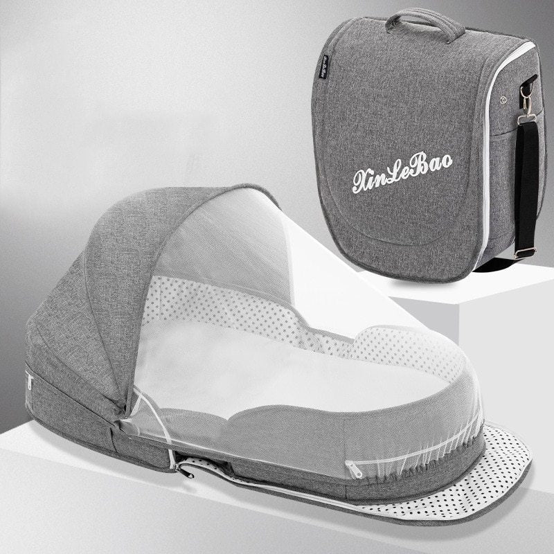 Diaper backpack with foldable bed