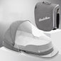 Diaper backpack with foldable bed