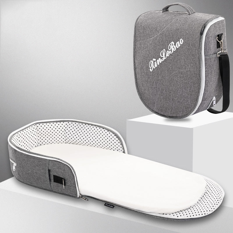 Diaper backpack with foldable bed