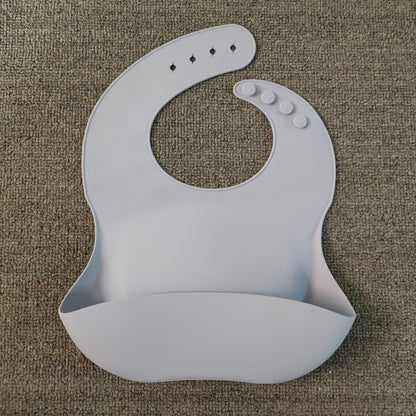 Bavoir en silicone souple et imperméable