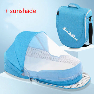 Diaper backpack with foldable bed