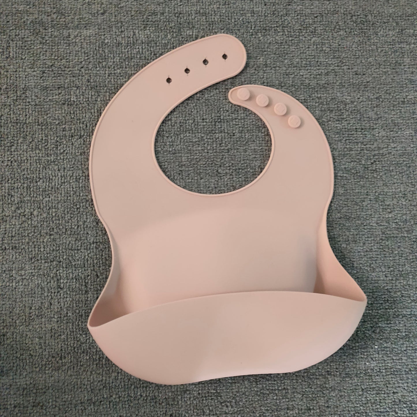 Bavoir en silicone souple et imperméable