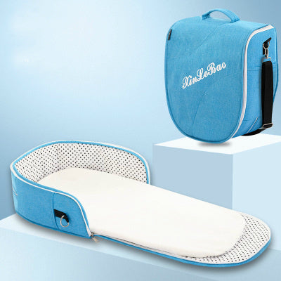 Diaper backpack with foldable bed