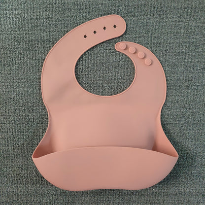 Bavoir en silicone souple et imperméable