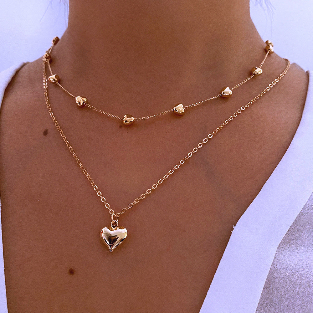 Gold Multi-Row Necklace with Heart Pendant