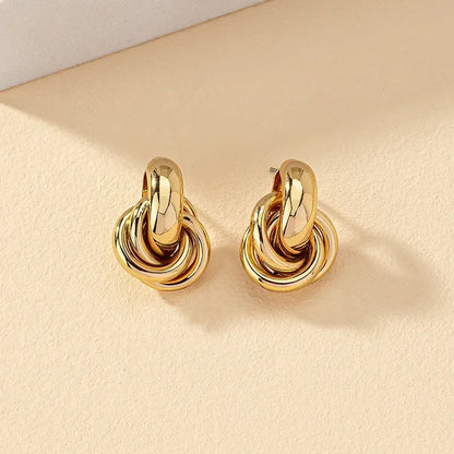 Boucles d'Oreilles Créoles Nœud – Dorées & Argentées