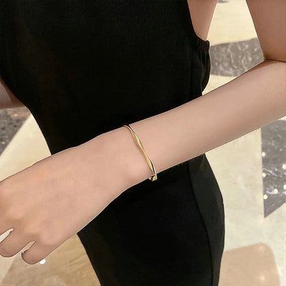 Bracelet Torsadé Doré – Style Classique